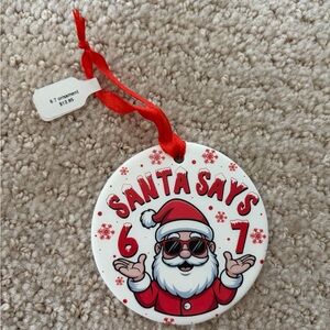 Santa Says 6-7 ceramic Christmas Ornament